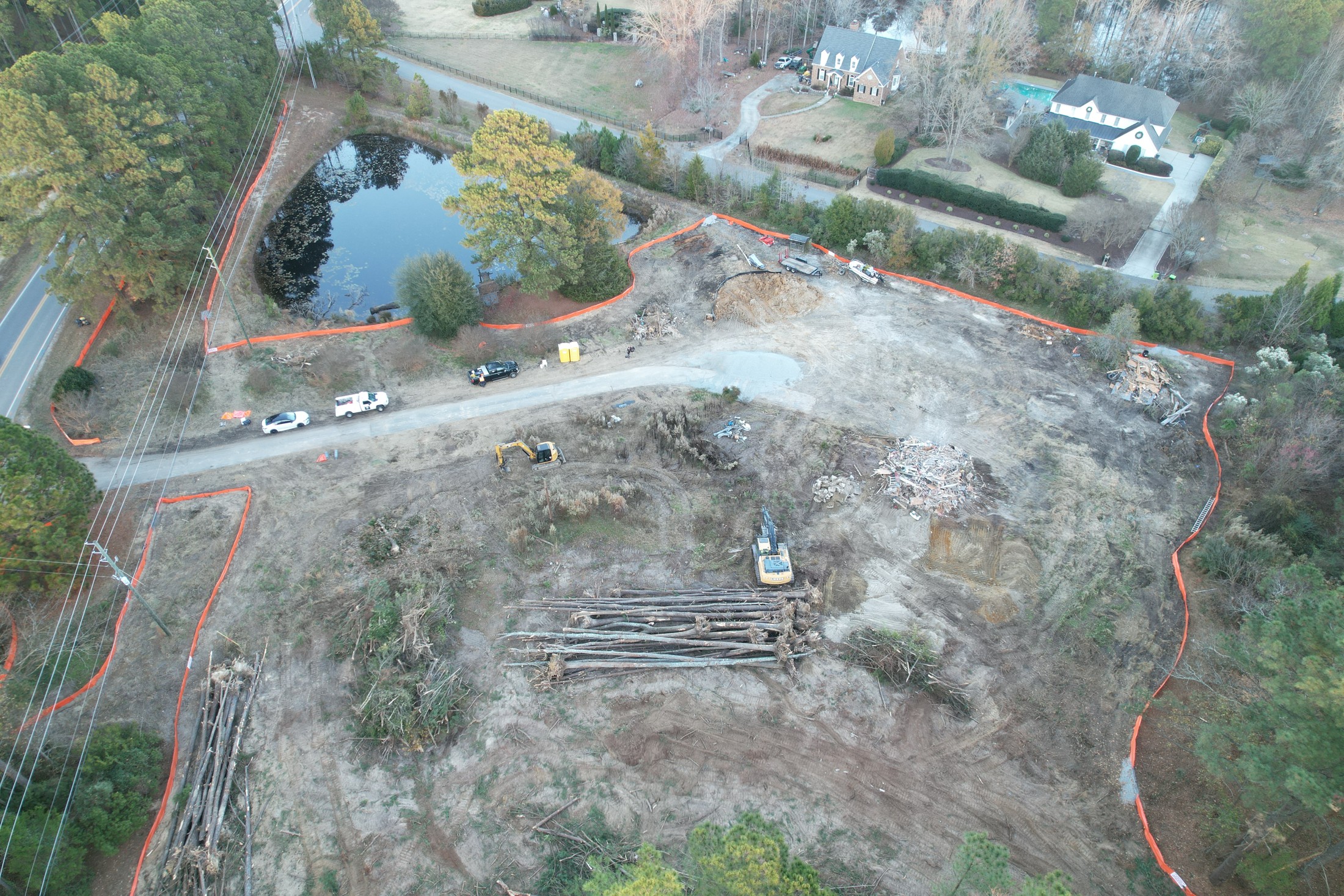 Construction overview with grading, access, and the full site footprint