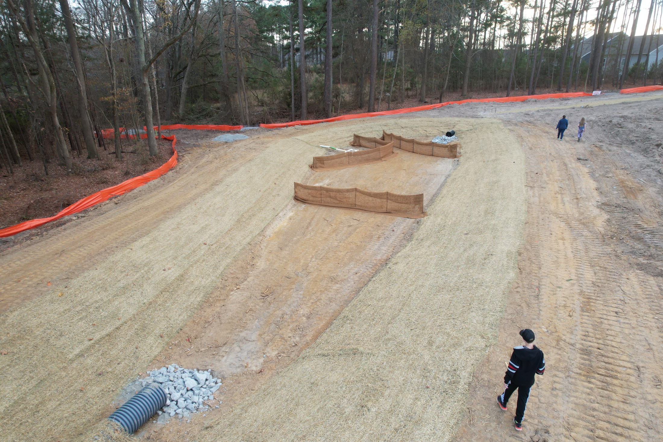Construction grading with equipment and a clear overhead view
